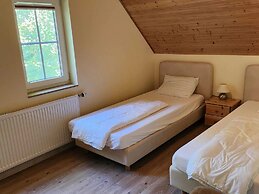 Tidy House With Sauna and Steam Bath, in a Forest