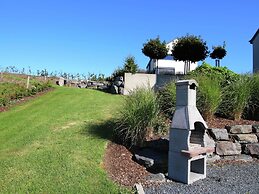 Classy Holiday Home in Martilly with Hot Tub