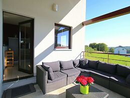 Classy Holiday Home in Martilly with Hot Tub