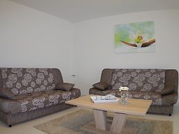 Apartment in Rakalj With Garden
