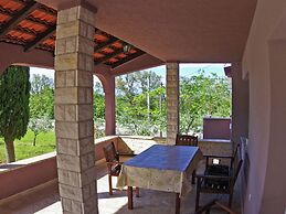 Apartment in Rakalj With Garden