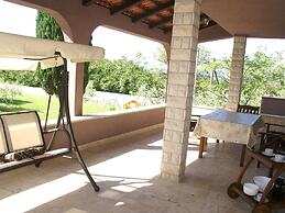 Apartment in Rakalj With Garden