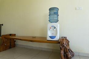 RedDoorz Syariah near Sultan Muhammad Kaharuddin Airport