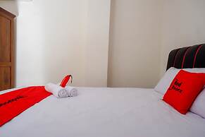 RedDoorz Syariah near GOR Satria 4