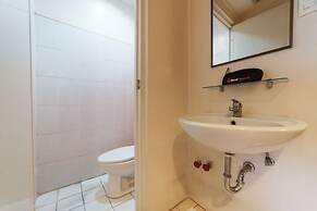 RedDoorz Plus @ E Rodriguez Corner Banawe