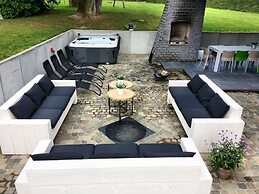 Luxurious Holiday Home in Courtil with Hot Tub