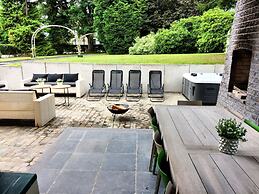 Luxurious Holiday Home in Courtil with Hot Tub