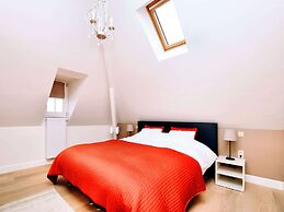 Luxurious Holiday Home in Courtil with Hot Tub