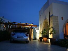 Belvilla by OYO Quattro Colonne Uno con Piscina