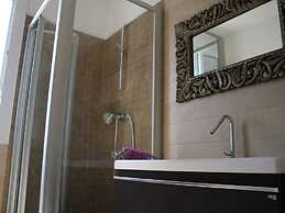 Belvilla by OYO Quattro Colonne Uno con Piscina