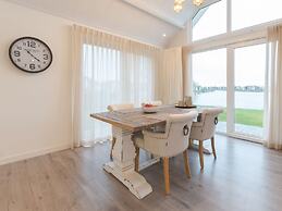 Stylish Holiday Home with Fireplace near Oosterschelde