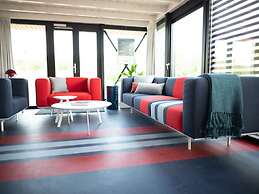 Modern, Trendy F1 Theme Lodge, Near the Sea