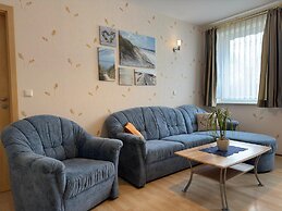 Charmante Ferienwohnung mit Garten in Wiek