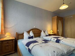 Charmante Ferienwohnung mit Garten in Wiek