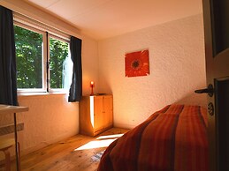 Chalet With Private Tennis Court in Humain