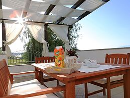 Modern Ground Floor Apartment With Private Terrace Near the Sea