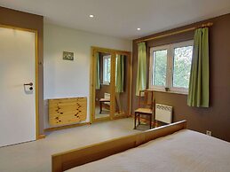 Detached, Cosy Holiday Home With Sauna in a Wooded Area