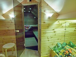Detached, Cosy Holiday Home With Sauna in a Wooded Area