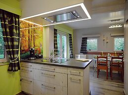 Detached, Cosy Holiday Home With Sauna in a Wooded Area