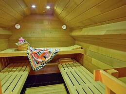 Detached, Cosy Holiday Home With Sauna in a Wooded Area