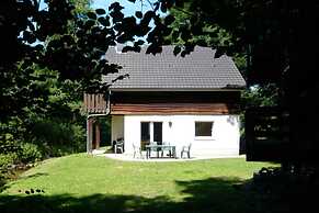Detached, Cosy Holiday Home With Sauna in a Wooded Area