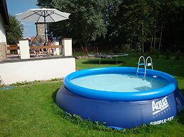 Serene Holiday Home in Mladé Buky with Private Pool and Trampoline