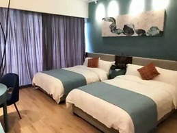 Yi Shu Jing Pin Holiday Hotel