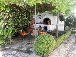 Spacious Apartment With Terrace & Outdoor Kitchen Surrounded by a Gard