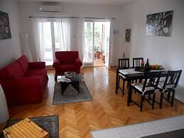 Spacious Apartment With Terrace & Outdoor Kitchen Surrounded by a Gard