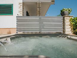 Holiday Apartment With a Private Terrace & Hot Tub, Near the Beach