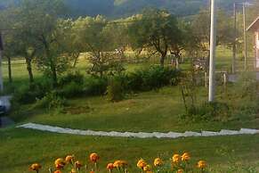 Traditional Wooden House by the River