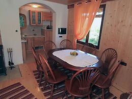 Traditional Wooden House by the River