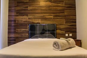 Homey and Warm 3BR Apartment at Ambassade Residences