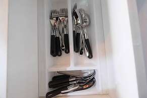 Minimalist and Posh 1BR The Oasis Cikarang Apartment