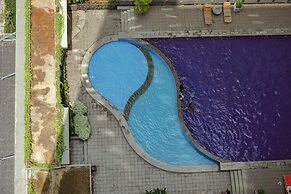 Tranquil Green Pramuka 2BR Apartment near Shopping Center