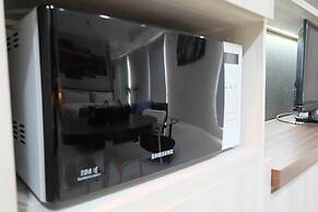 Elegant and Comfy Studio Azalea Suites Apartment Cikarang