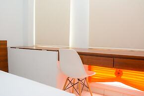 Comfy Studio Room at Patraland Urbano Apartment