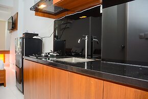 Comfy Studio Room at Patraland Urbano Apartment