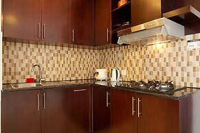 Relaxing 2BR at The Empyreal Condominium Epicentrum Apartment By Trave