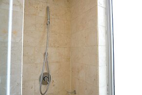 Relaxing 2BR at The Empyreal Condominium Epicentrum Apartment By Trave