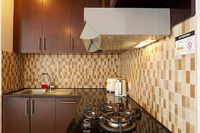 Relaxing 2BR at The Empyreal Condominium Epicentrum Apartment By Trave