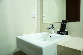 Modern with City View @ Studio Puri Mansion Apartment By Travelio