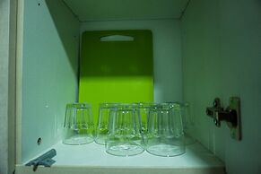 Modern with City View @ Studio Puri Mansion Apartment By Travelio