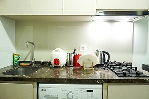 Modern with City View @ Studio Puri Mansion Apartment By Travelio