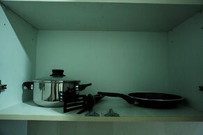 Modern with City View @ Studio Puri Mansion Apartment By Travelio