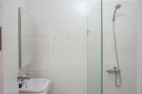 Minimalist and Stylish Studio Skylounge Tamansari Apartment By Traveli