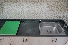 Minimalist and Stylish Studio Skylounge Tamansari Apartment By Traveli