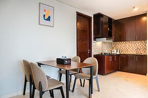 Cozy 2BR at Empyreal Epicentrum Apartment By Travelio