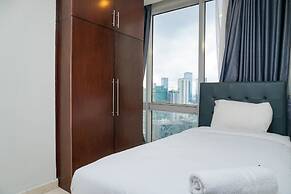 Cozy 2BR at Empyreal Epicentrum Apartment By Travelio