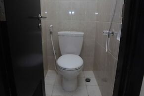 Comfy and Spacious 2BR The Masterpiece Epicentrum Apartment By Traveli